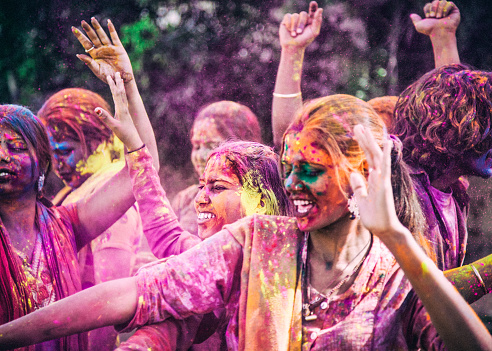 A group of young Indians hugging during the Holi Festival, in Jaipur India.